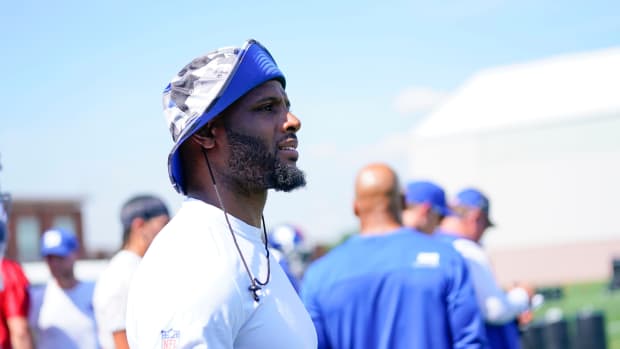 Mike Adams, of Paterson, assists in coaching the New York Giants defense on the first day of training camp at Quest Diagnostics Training Center in East Rutherford on Wednesday, July 27, 2022.